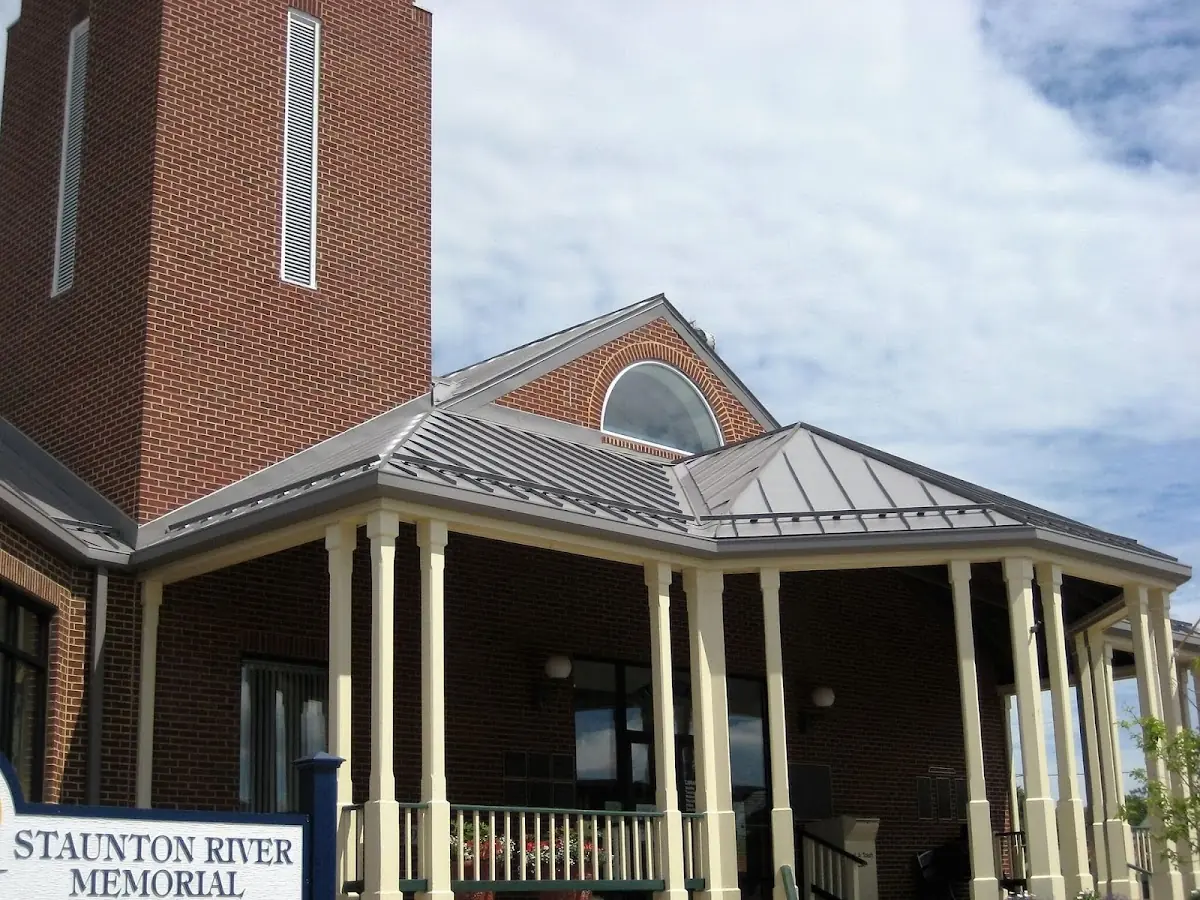 Skilled roofing craftsmen working on a residential roof in Myrtle